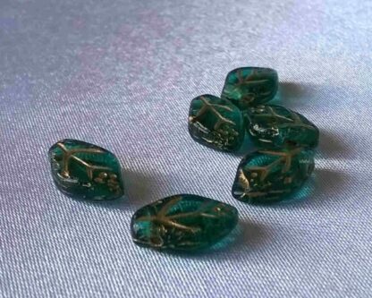 Korálky skleněné mačkané 12 x 7 mm 10 ks - A50253